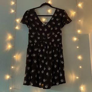 Black V neck dress with straps on the back